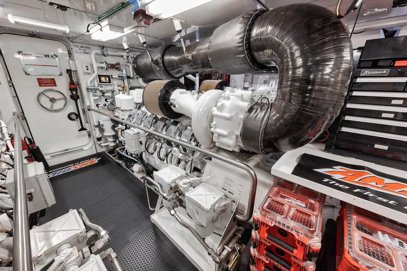 Burn Rate Yacht Photos Pics Engine room of a 2006 Palmer Johnson Express yacht, featuring advanced machinery and equipment.