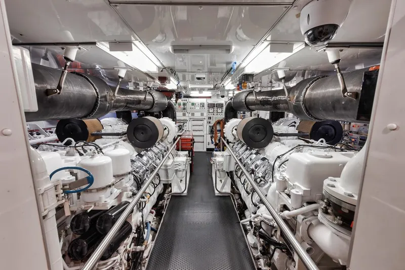 Burn Rate Yacht Photos Pics Engine room of a 2006 Palmer Johnson Express yacht, showcasing machinery and equipment.