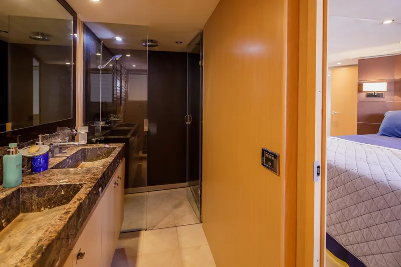 Black Sugar Yacht Photos Pics Luxurious bathroom and bedroom interior on a 2010 Princess V78 yacht.