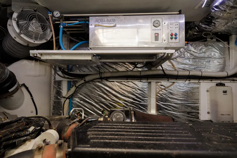 Black Sugar Yacht Photos Pics Engine room of 2010 Princess V78 yacht with Aqua-Base watermaker system.
