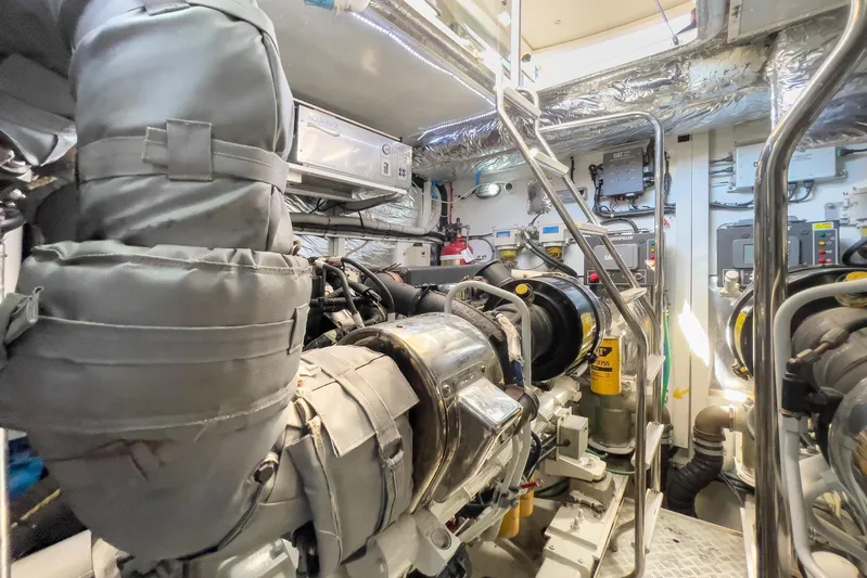 Black Sugar Yacht Photos Pics Engine room of 2010 Princess V78 yacht, featuring advanced machinery and equipment.