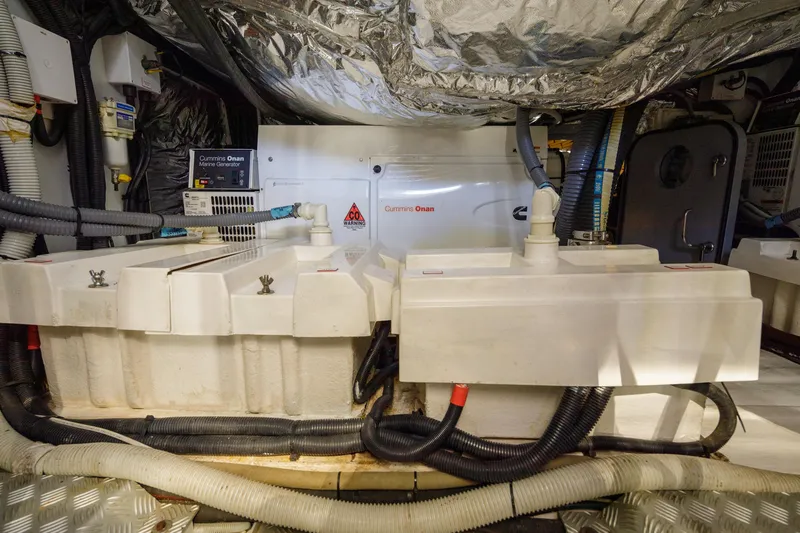 Black Sugar Yacht Photos Pics Engine room of 2010 Princess V78 yacht with Cummins Onan marine generator.