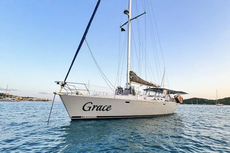 Grace Yacht Photos Pics Sailing yacht "Grace," Beneteau 510, 1994 model, anchored in serene waters.