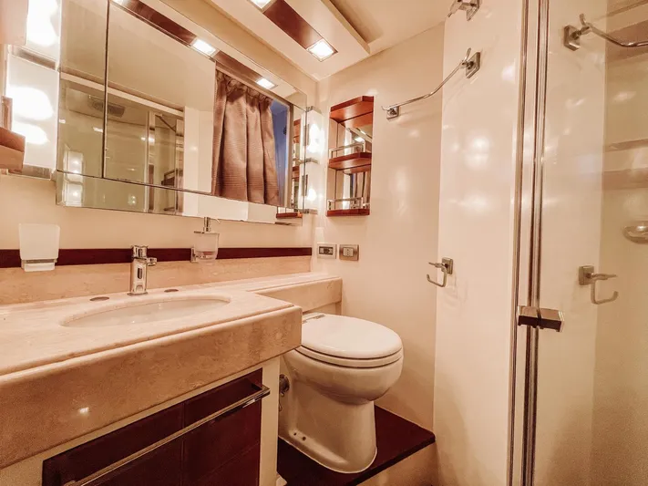  Yacht Photos Pics Luxurious bathroom in a 2009 Azimut 75 yacht, featuring elegant fixtures and modern design.