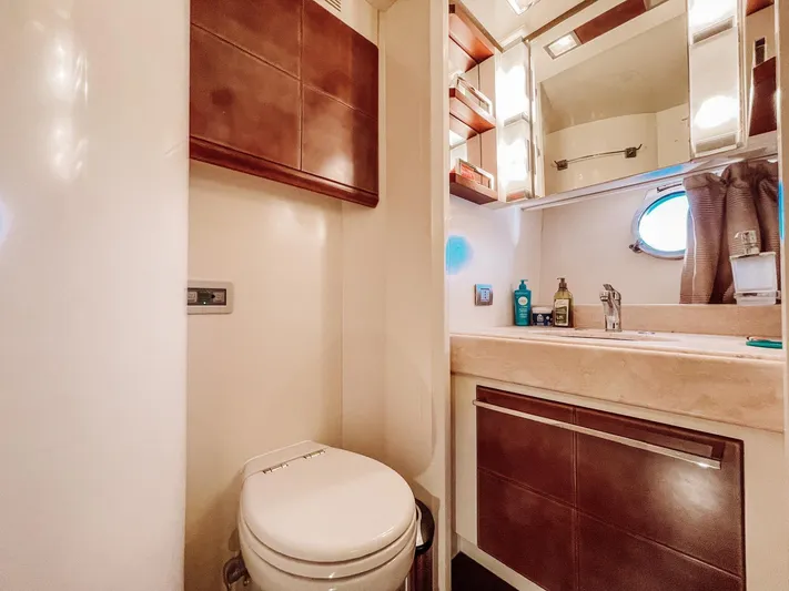  Yacht Photos Pics Luxurious bathroom in 2009 Azimut 75 yacht with modern fixtures and elegant design.