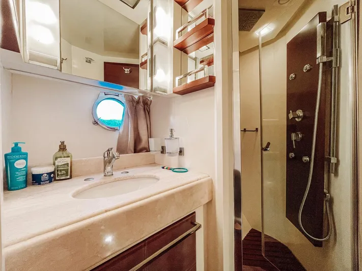  Yacht Photos Pics Luxurious bathroom in 2009 Azimut 75 yacht with modern fixtures and shower.