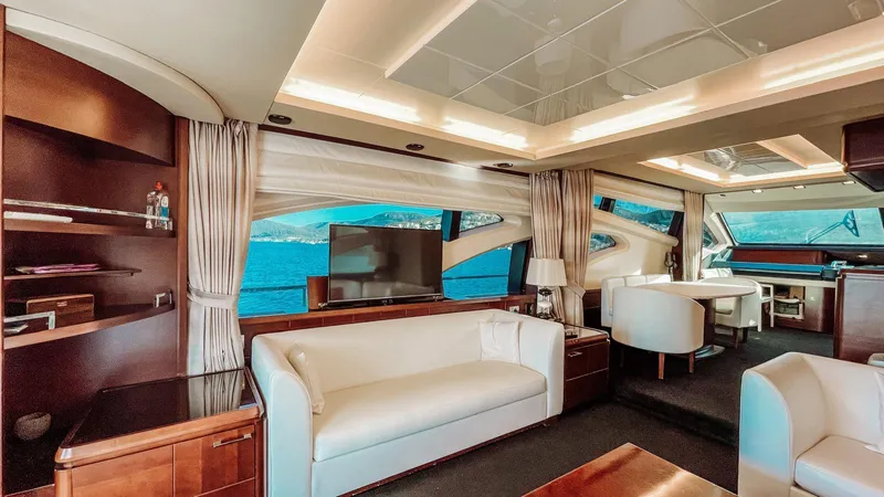  Yacht Photos Pics Luxurious interior of a 2009 Azimut 75 yacht with elegant seating and panoramic windows.