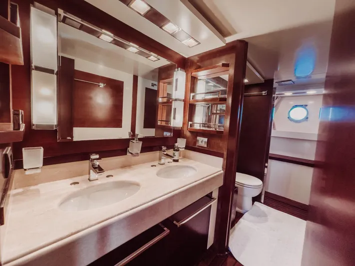 Yacht Photos Pics Luxurious bathroom interior of 2009 Azimut 75 yacht with double sinks and modern fixtures.