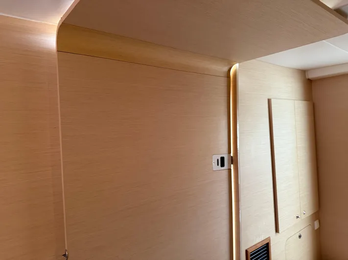 Feel The Moon Yacht Photos Pics Interior of 2010 Lagoon 400 yacht, featuring light wood paneling and modern design elements.