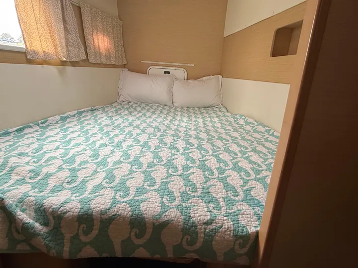 Feel The Moon Yacht Photos Pics Cozy bedroom in 2010 Lagoon 400 yacht with seahorse-patterned bedding.