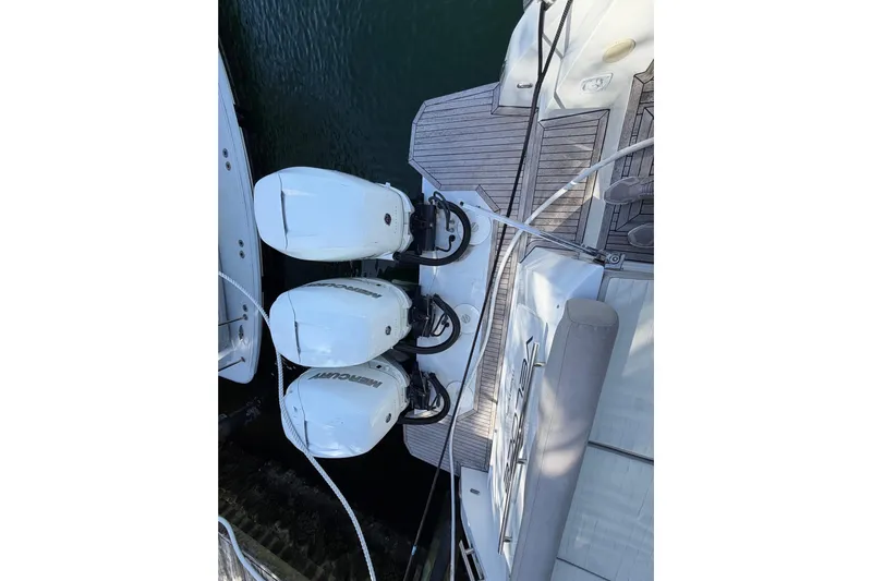 Veloce Yacht Photos Pics 2017 Azimut Verve 40 with triple Mercury outboard engines, docked on water.