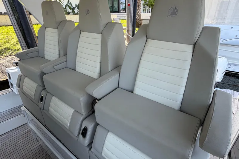 Veloce Yacht Photos Pics Luxurious seating on 2017 Azimut Verve 40 yacht, featuring elegant gray and white upholstery.