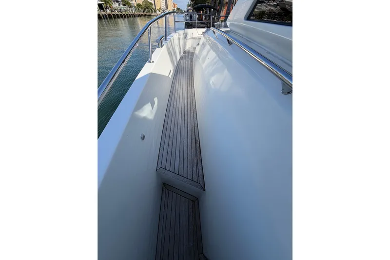 Veloce Yacht Photos Pics 2017 Azimut Verve 40 yacht deck with sleek design and wooden flooring.