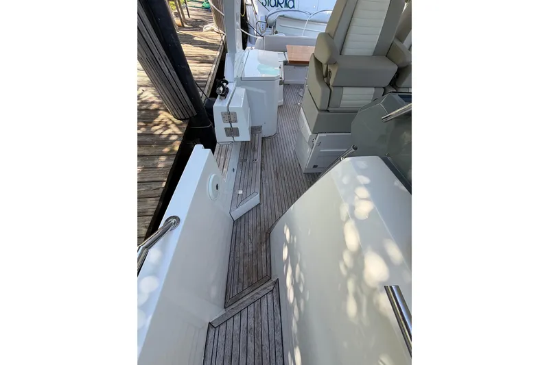 Veloce Yacht Photos Pics 2017 Azimut Verve 40 yacht interior with sleek seating and wooden flooring.