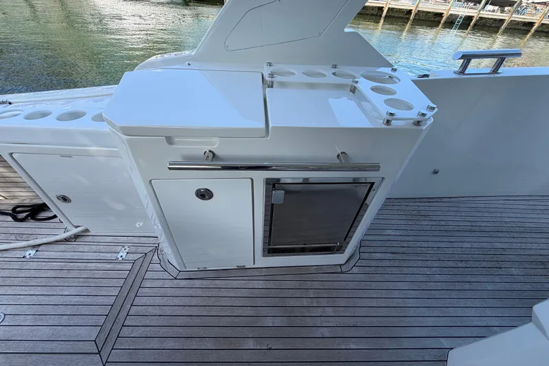 Veloce Yacht Photos Pics 2017 Azimut Verve 40 yacht deck with sleek cabinetry and cup holders.