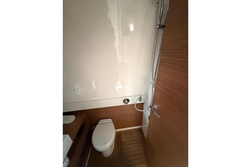 Veloce Yacht Photos Pics Bathroom interior of 2017 Azimut Verve 40 yacht, featuring modern fixtures and wooden accents.