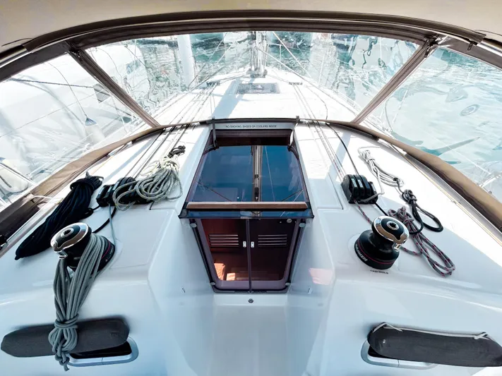 Soca Sleigh Yacht Photos Pics 2024 Jeanneau Sun Odyssey 380 cockpit with ropes and winches, showcasing sleek design and functionality.