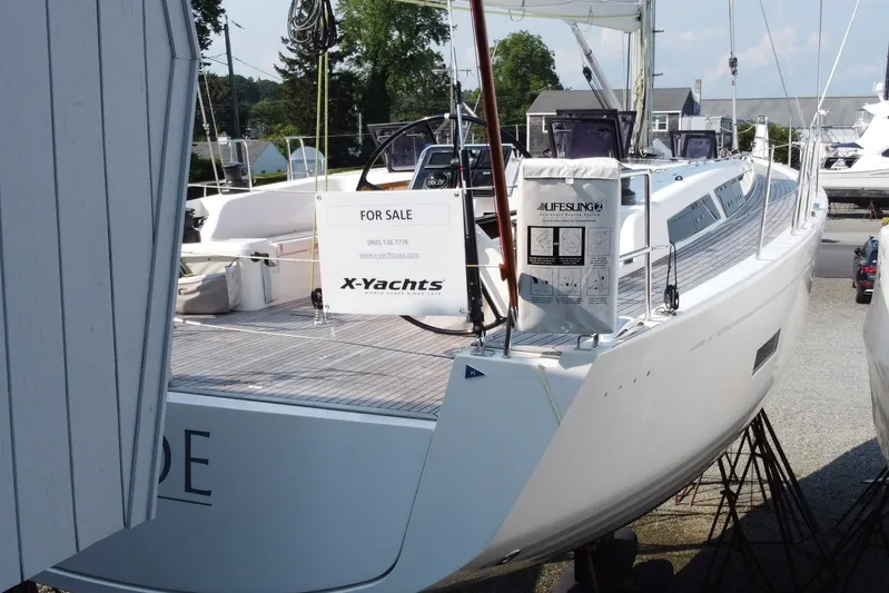 Abide Yacht Photos Pics 2018 X-Yachts X4.9 sailboat for sale, docked with visible signage.