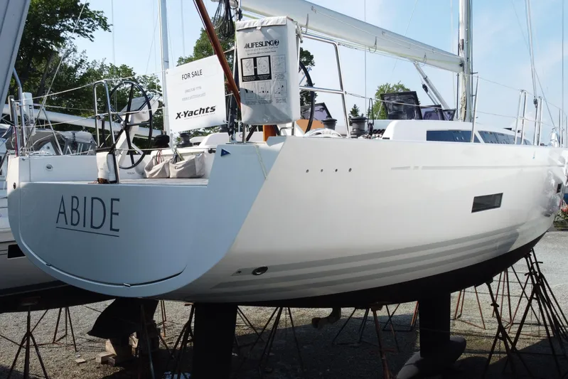 Abide Yacht Photos Pics 2018 X-Yachts X4.9 sailboat named "Abide" for sale, displayed on stands.