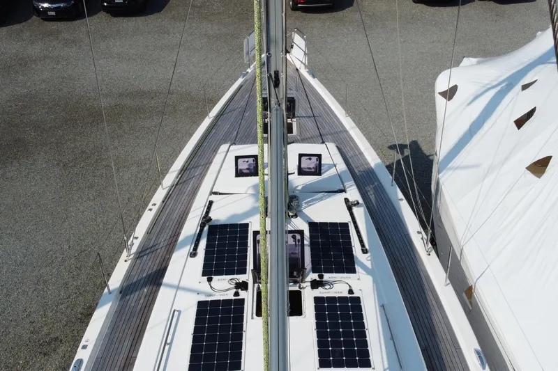 Abide Yacht Photos Pics 2018 X-Yachts X4.9 sailboat deck with solar panels, docked in a marina.