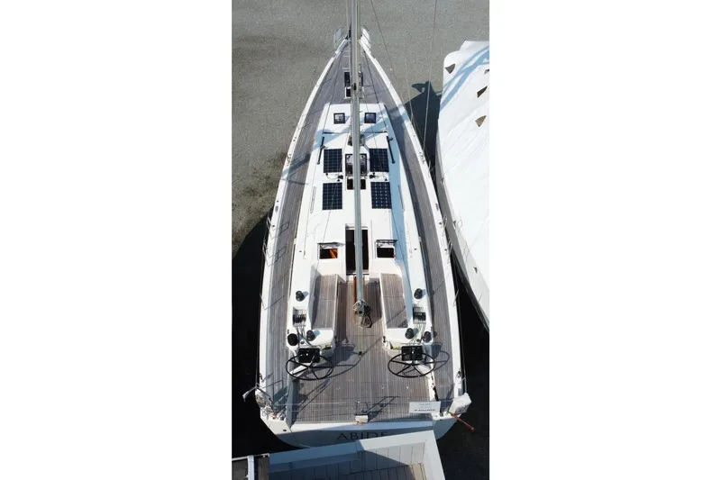 Abide Yacht Photos Pics Overhead view of 2018 X-Yachts X4.9 sailboat docked, showcasing deck and dual steering wheels.