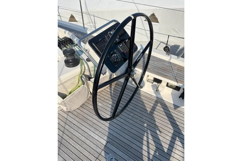 Abide Yacht Photos Pics Steering wheel of 2018 X-Yachts X4.9 sailboat on teak deck.