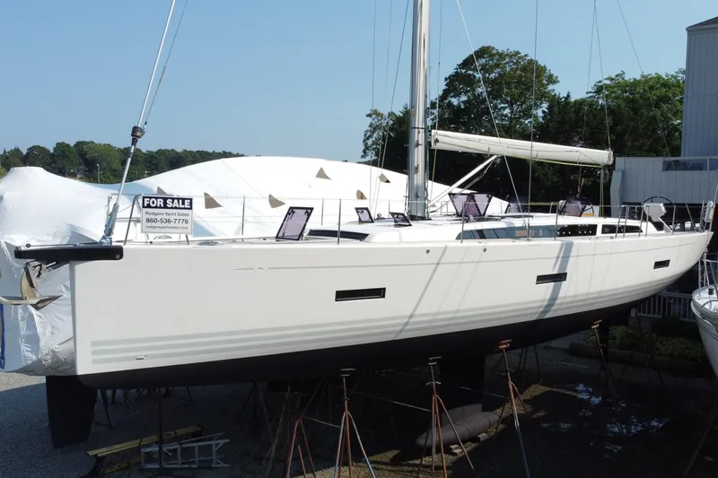 Abide Yacht Photos Pics 2018 X-Yachts X4.9 sailboat for sale, displayed on stands, with contact information visible.