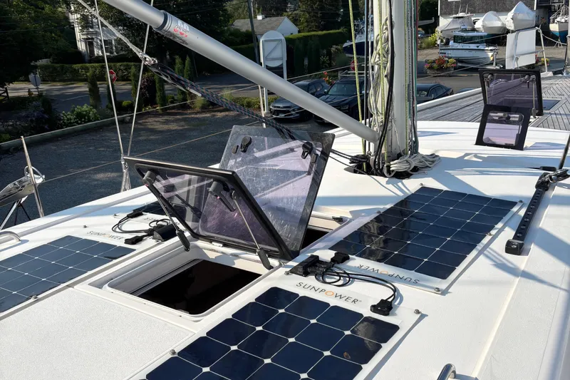 Abide Yacht Photos Pics 2018 X-Yachts X4.9 sailboat deck with solar panels and open hatches.