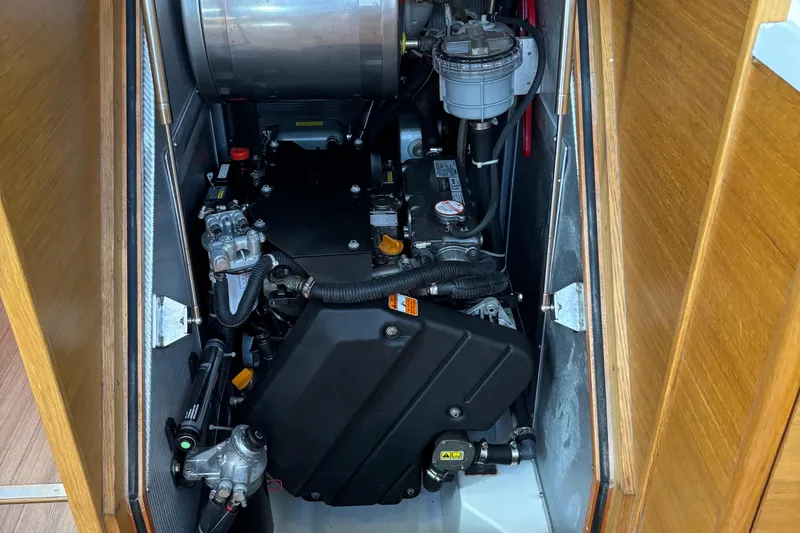 Abide Yacht Photos Pics Engine compartment of 2018 X-Yachts X4.9, showcasing mechanical components and wiring.