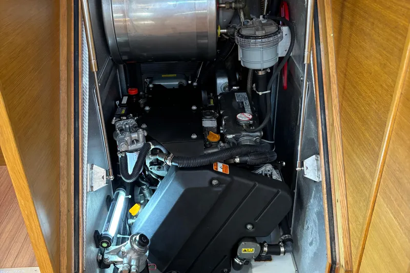 Abide Yacht Photos Pics Engine compartment of 2018 X-Yachts X4.9, showcasing mechanical components and wiring.