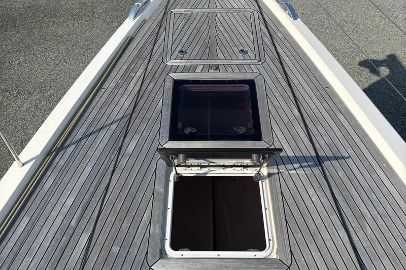 Abide Yacht Photos Pics Deck of 2018 X-Yachts X4.9 with open hatch, showcasing sleek design.