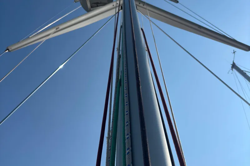 Abide Yacht Photos Pics Mast and rigging of 2018 X-Yachts X4.9 sailboat against clear blue sky.