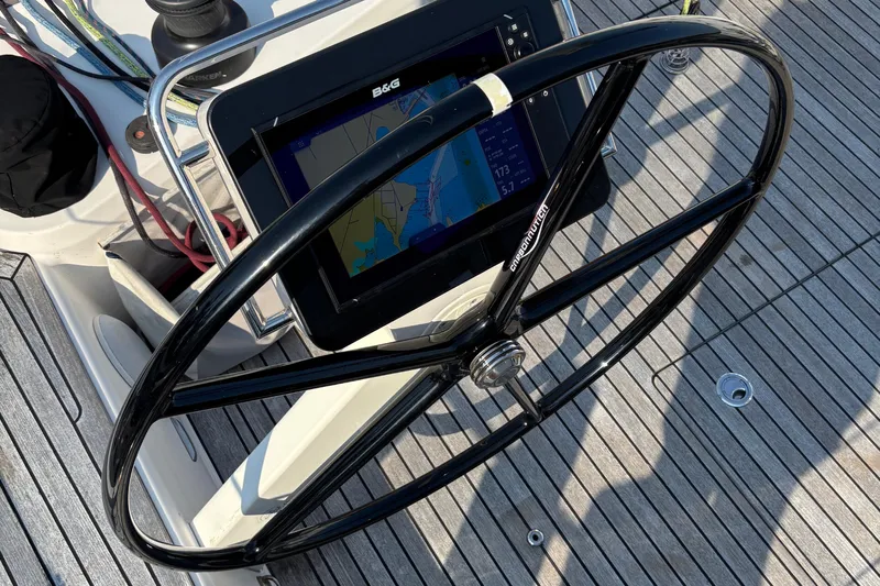 Abide Yacht Photos Pics Steering wheel and navigation system on 2018 X-Yachts X4.9 sailboat deck.