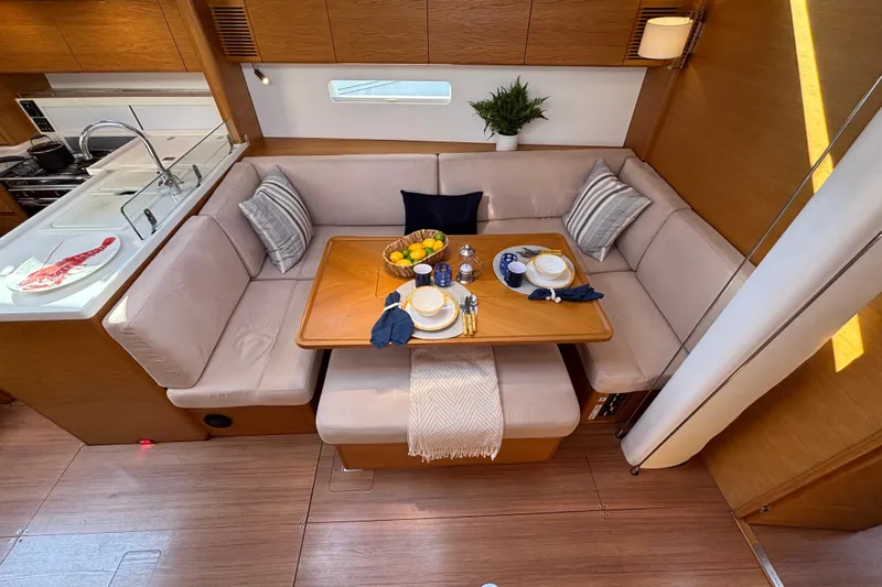 Abide Yacht Photos Pics Luxurious interior of 2018 X-Yachts X4.9 with elegant dining area and modern kitchen.