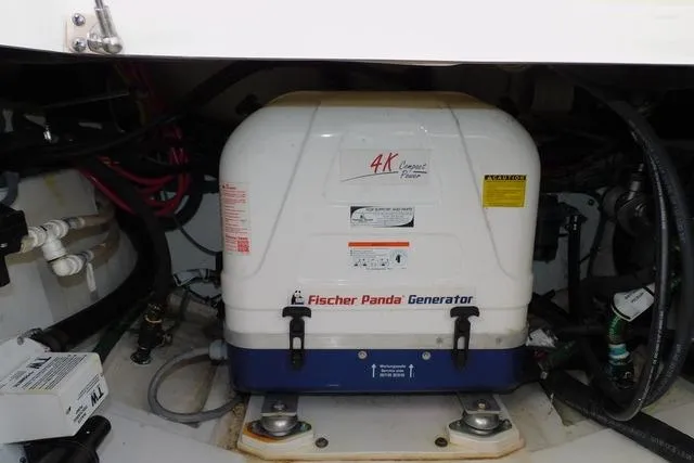  Yacht Photos Pics Fischer Panda generator in 2019 Pursuit OS 325 Offshore boat engine compartment.