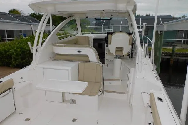  Yacht Photos Pics 2019 Pursuit OS 325 Offshore boat with spacious seating and modern design.