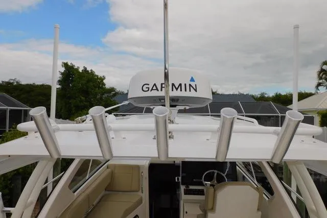  Yacht Photos Pics 2019 Pursuit OS 325 Offshore boat with Garmin radar and rod holders.