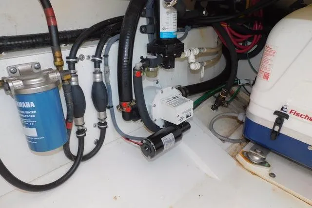  Yacht Photos Pics Engine compartment of a 2019 Pursuit OS 325 Offshore boat with Yamaha fuel filter.