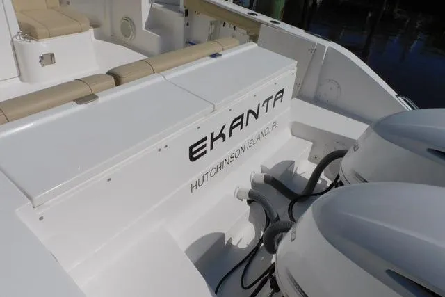 Yacht Photos Pics 2019 Pursuit OS 325 Offshore boat with dual engines, labeled "EKANTA," Hutchinson Island, FL.