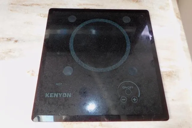  Yacht Photos Pics Kenyon cooktop on 2019 Pursuit OS 325 Offshore boat countertop.