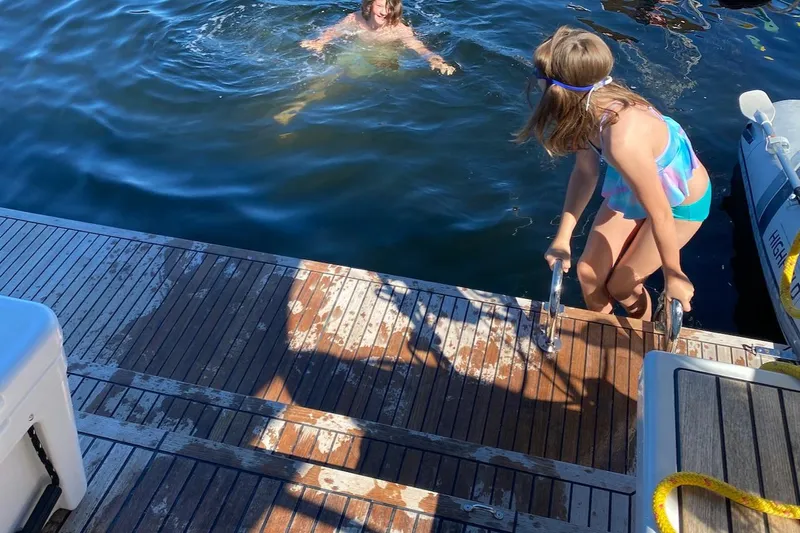 Run For The Roses Yacht Photos Pics Children enjoying water activities on a 2019 Beneteau Oceanis 46.1 yacht.