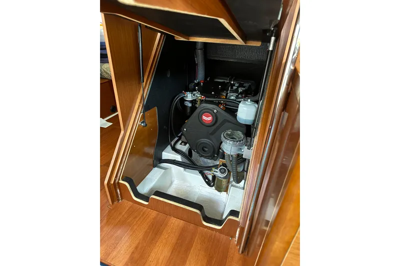 Run For The Roses Yacht Photos Pics Engine compartment of 2019 Beneteau Oceanis 46.1 sailboat, showcasing mechanical components.