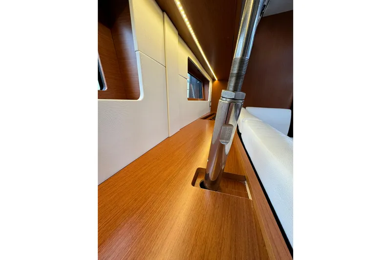 Run For The Roses Yacht Photos Pics Interior view of 2019 Beneteau Oceanis 46.1 yacht, featuring sleek wood finish and modern design.