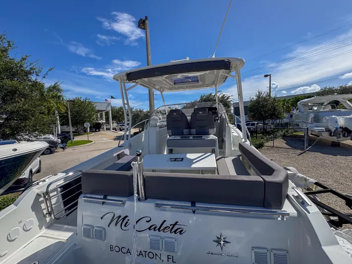 Mi Caleta Yacht Photos Pics 2023 Jeanneau Leader 9.0 WA boat docked in sunny Boca Raton, Florida.