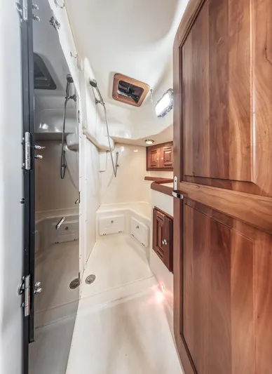 Kamala Yacht Photos Pics Interior of 2003 Tartan 3700 sailboat with wooden cabinetry and modern fixtures.