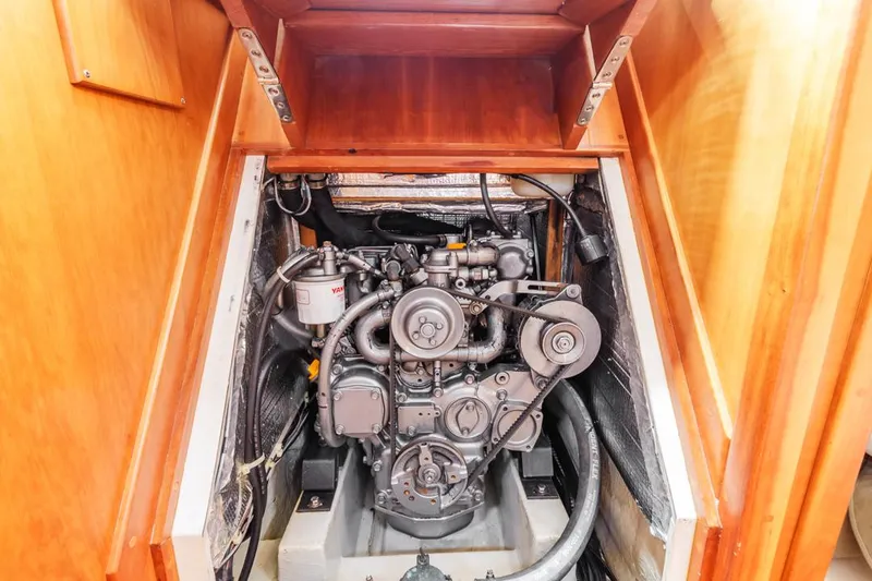 Kamala Yacht Photos Pics Engine compartment of a 2003 Tartan 3700 sailboat, showcasing detailed mechanical components.