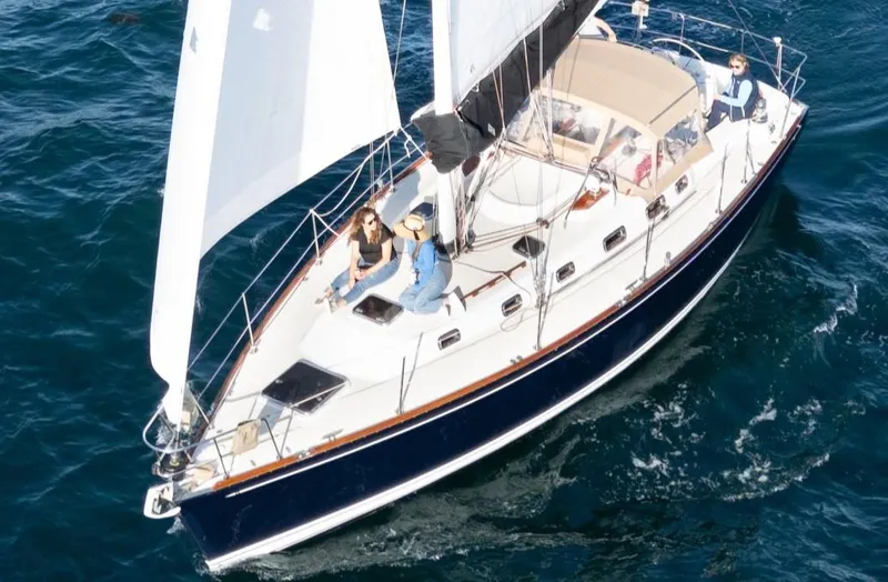 Kamala Yacht Photos Pics Sailing on a 2003 Tartan 3700 yacht in open waters.