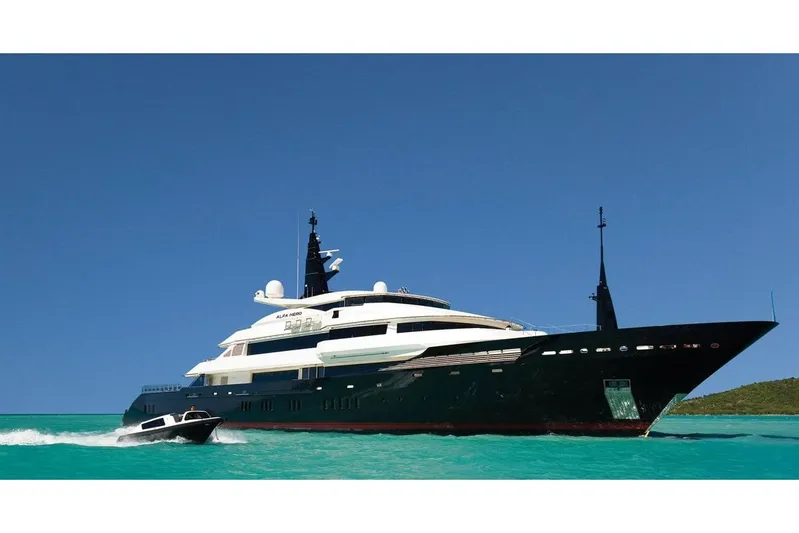Alfa Nero Yacht Photos Pics Luxurious 2007 Oceanco 269' yacht cruising in clear blue waters.