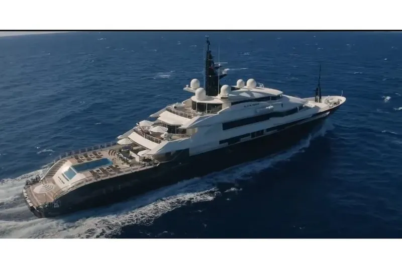 Alfa Nero Yacht Photos Pics Luxurious 2007 Oceanco 269' yacht cruising on open sea, featuring spacious decks and pool.