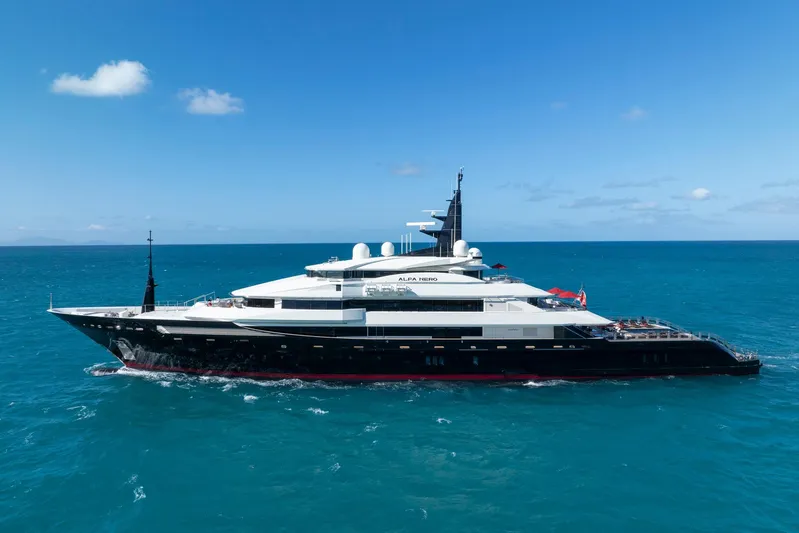 Alfa Nero Yacht Photos Pics Luxurious 2007 Oceanco 269' yacht cruising on clear blue ocean waters.